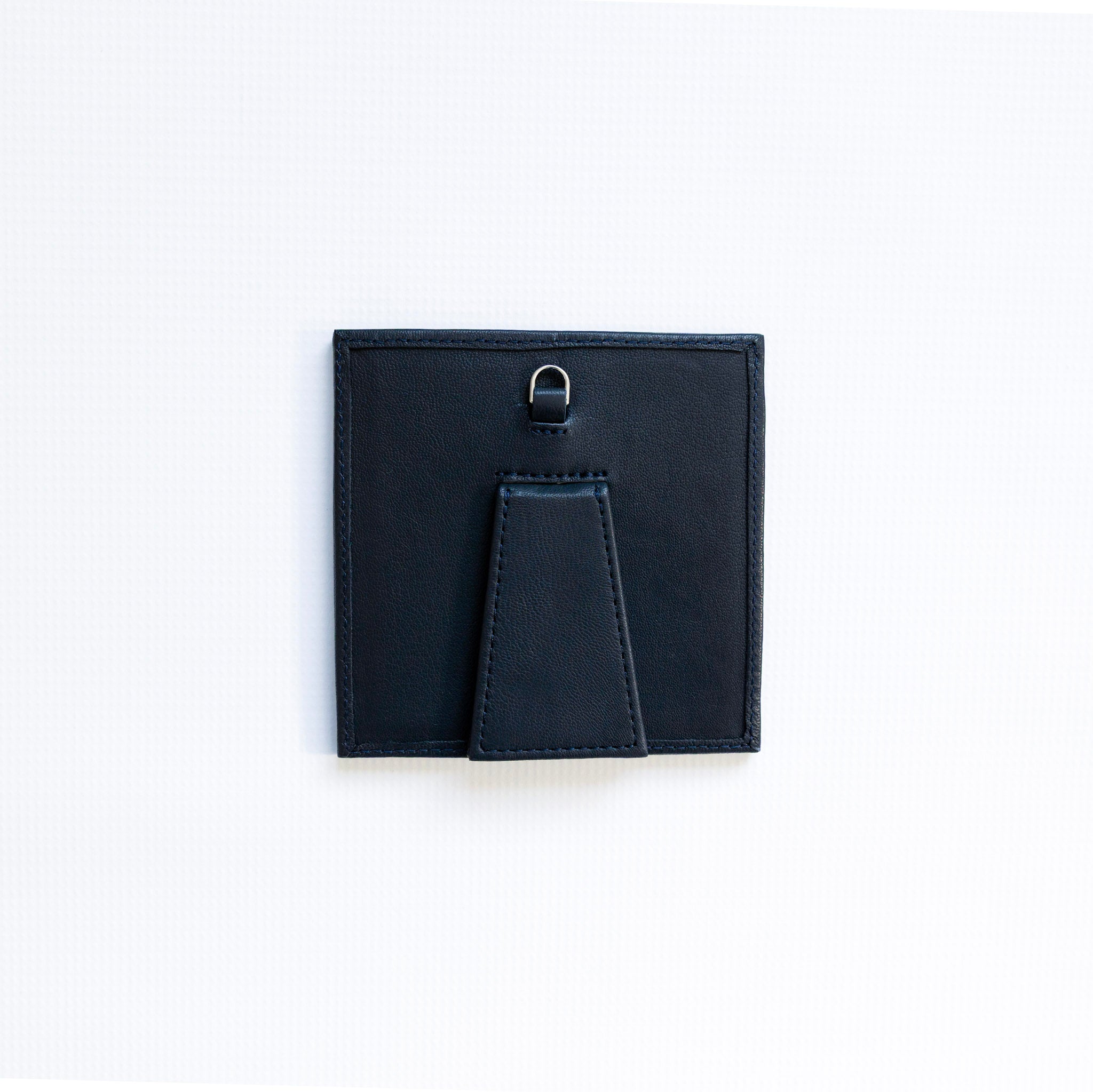 Small navy self finishing frame on a white background