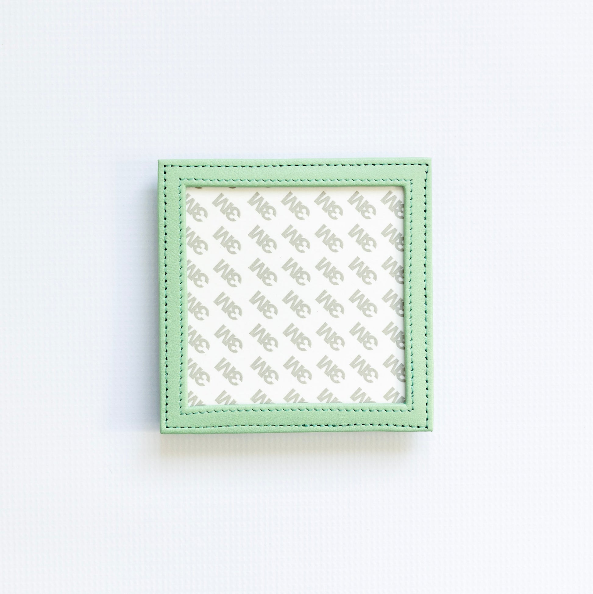 Green square self finishing fram in light green on a white background