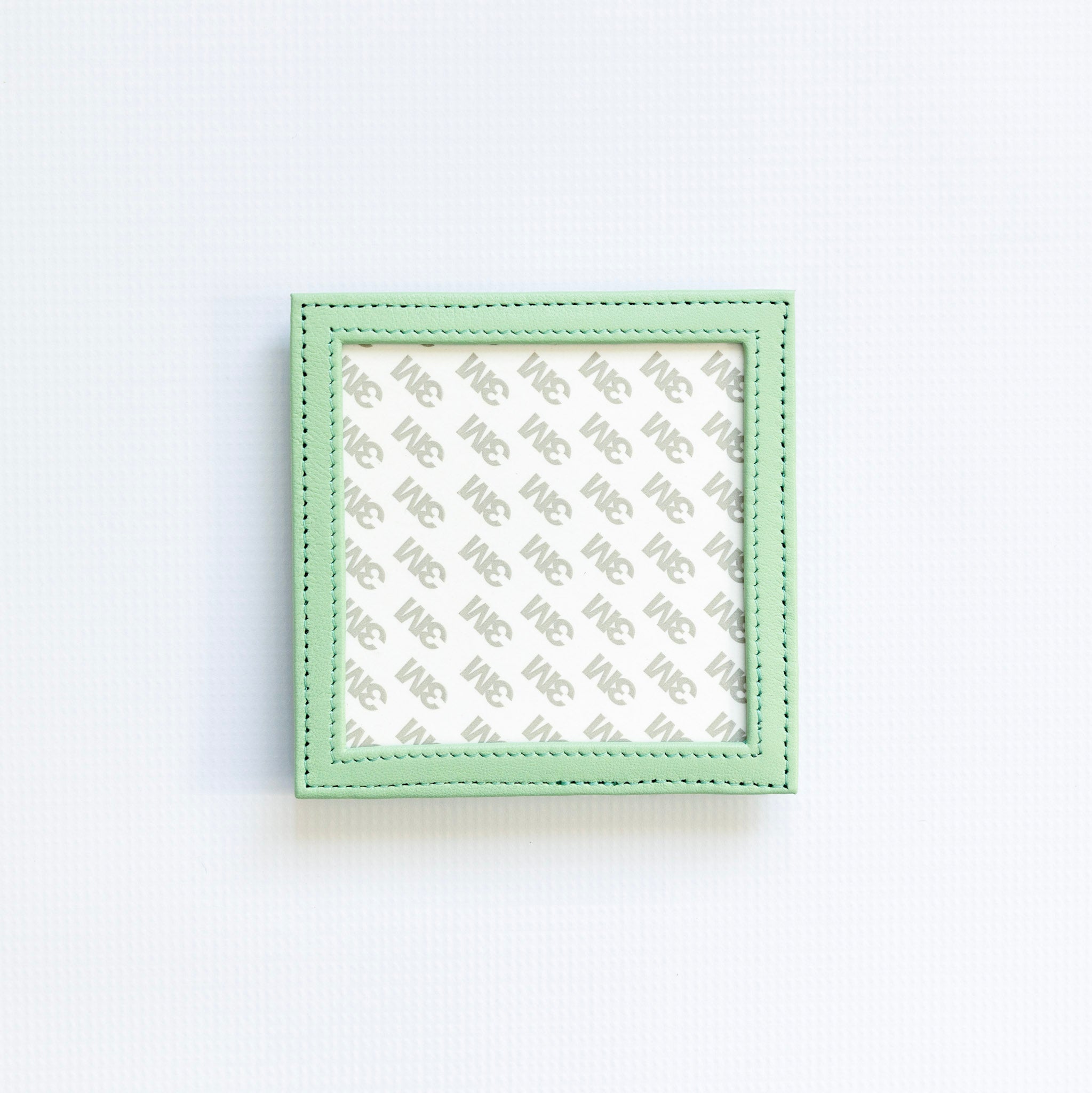 Green square self finishing fram in light green on a white background