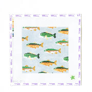 Needlepoint pattern with fish design on a light blue background