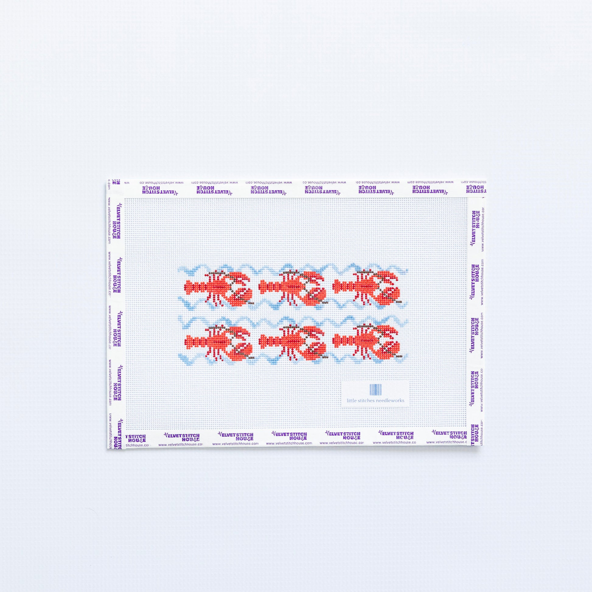 Needlepoint pattern with red lobster illustrations and light blue waves on a white background