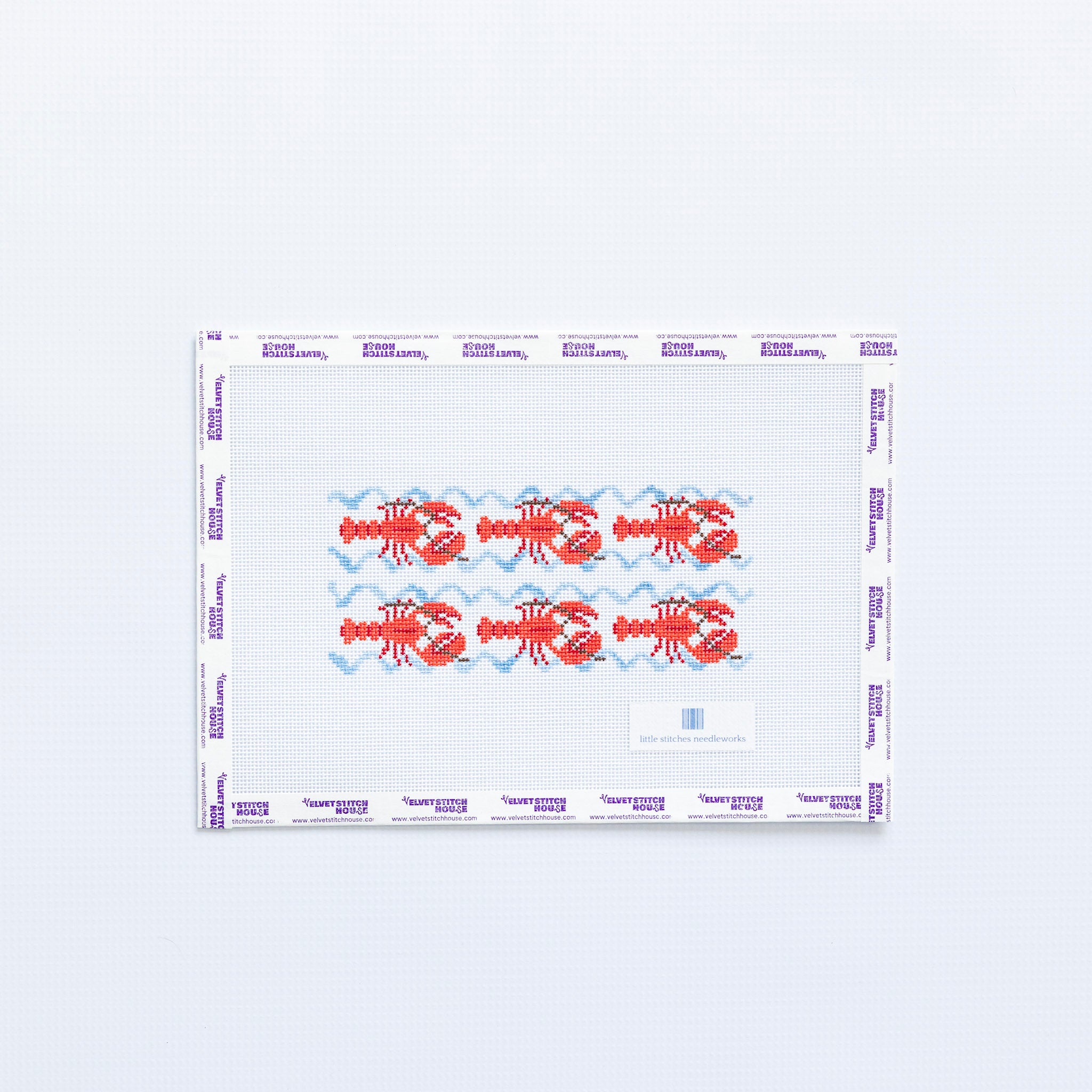 Needlepoint pattern with red lobster illustrations and light blue waves on a white background