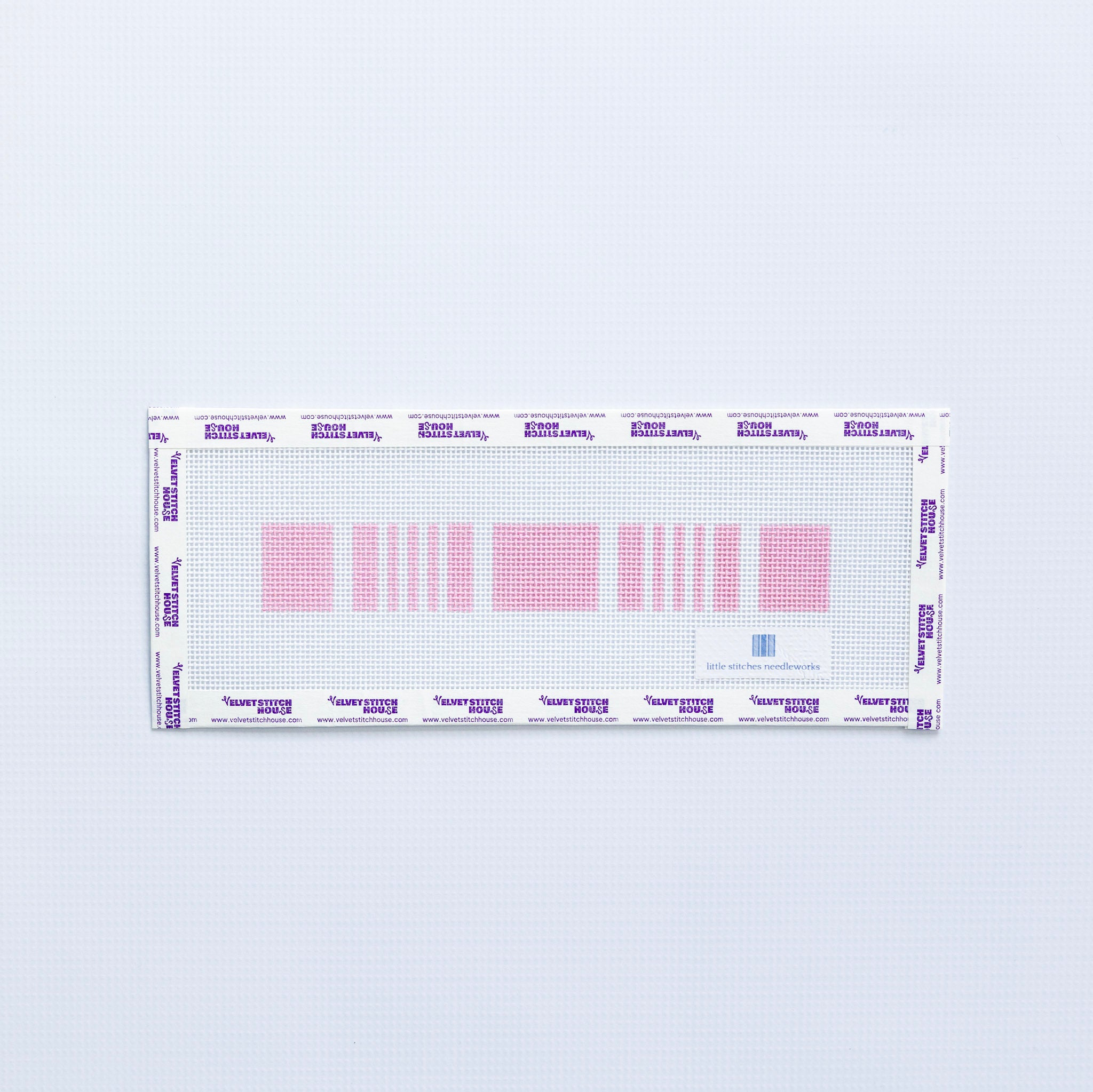 Needlepoint key fob pattern in pink on a white background