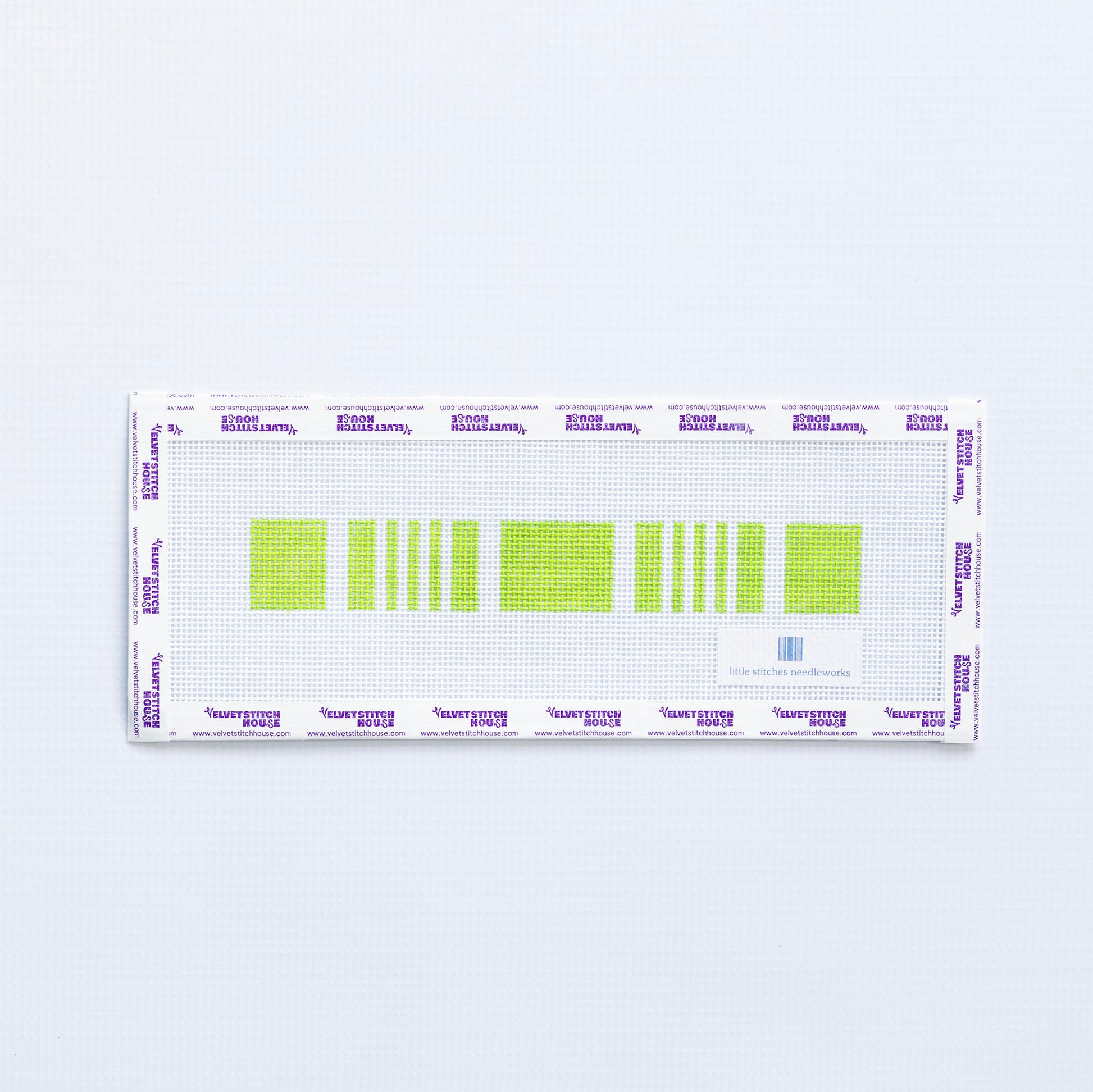 Needlepoint key fob pattern in green on a white background