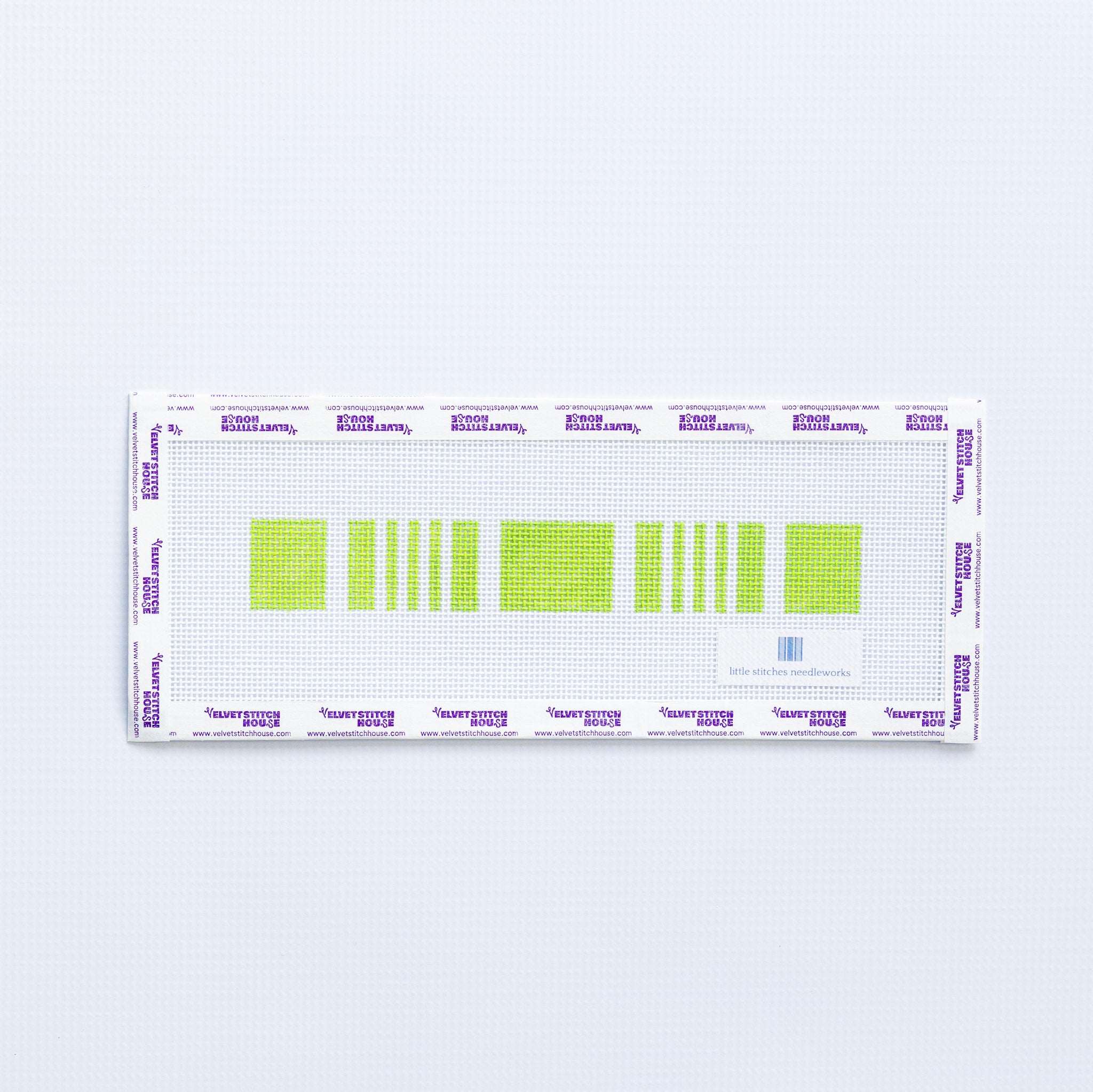 Needlepoint key fob pattern in green on a white background