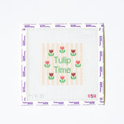 Needlepoint pattern with tulip design and 'Tulip Time' text on a white background