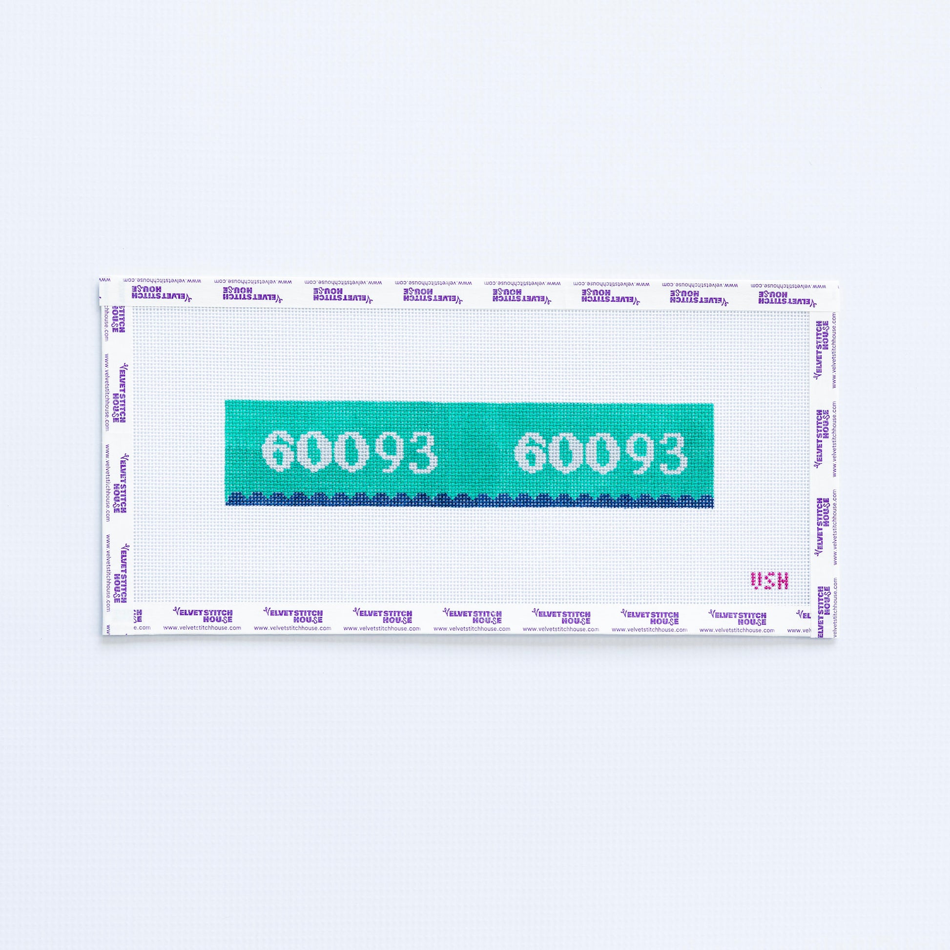 Needlepoint pattern key fob of a purple label displaying '60093' with yellow scallop edge.