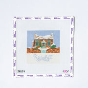 Needlepoint design of a house with 'Rosehill Cottage' text on a white background